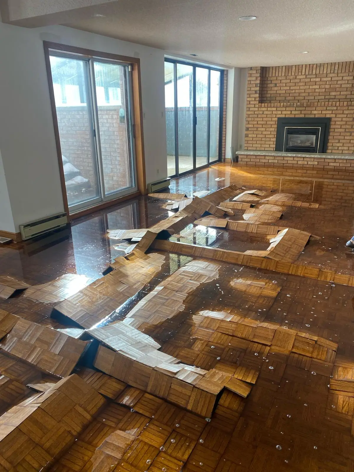 Water damage inside a Toronto home — visible moisture damage on walls and flooring requiring professional restoration