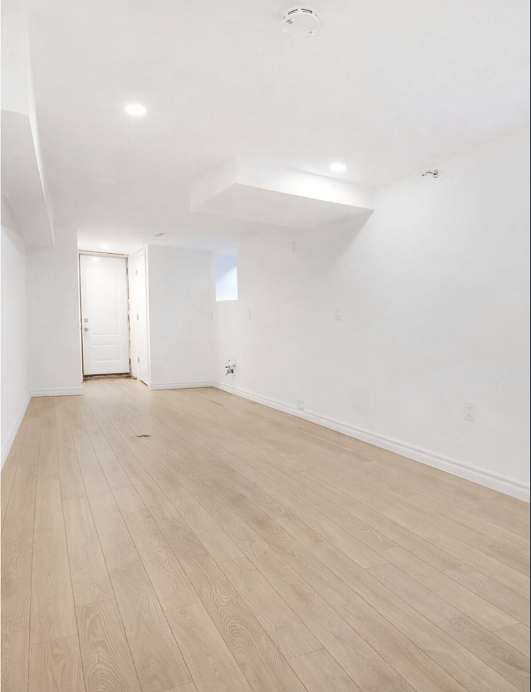 After — restored basement by Restoration Canada